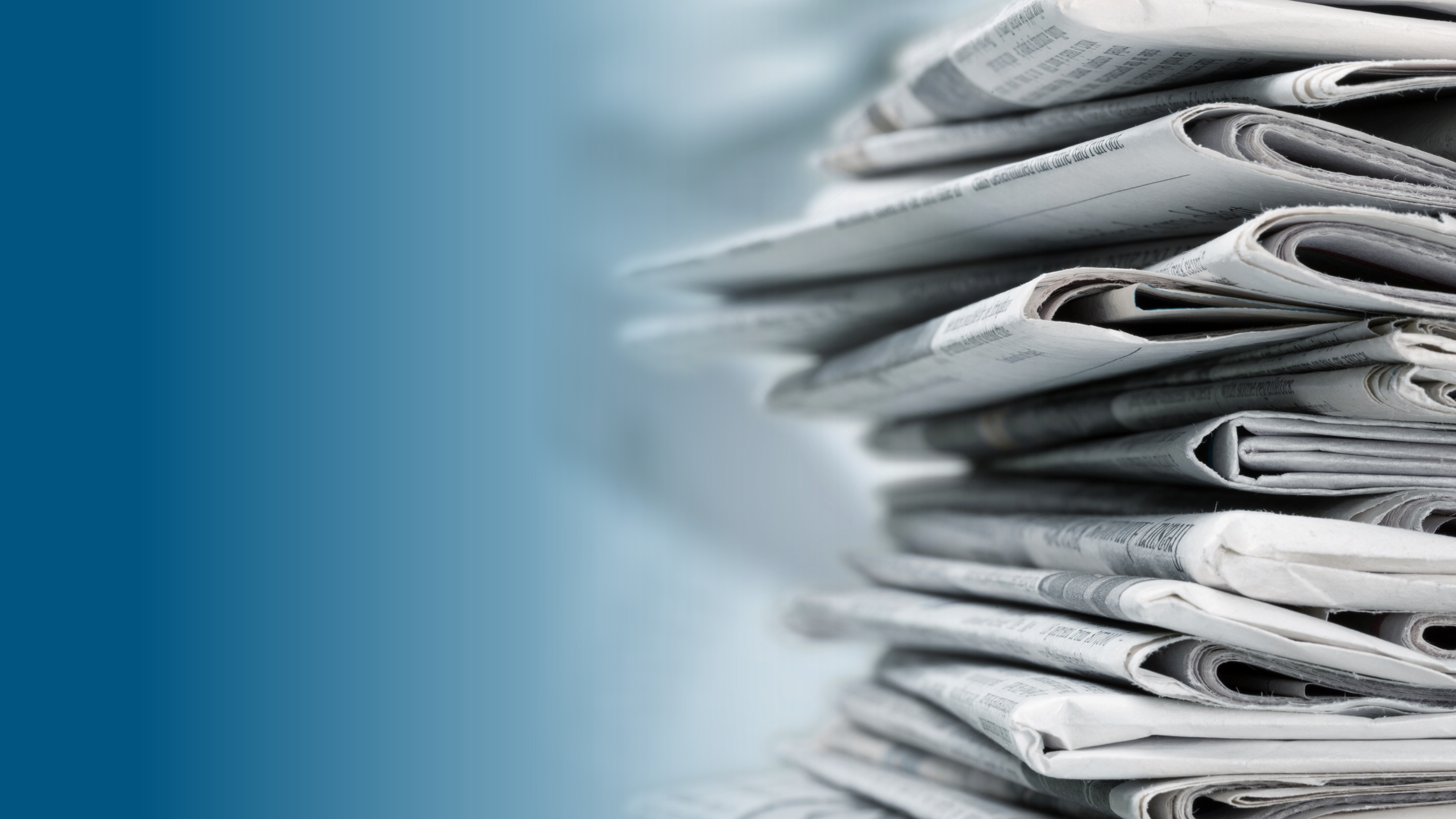 Picture of a stack of newspapers