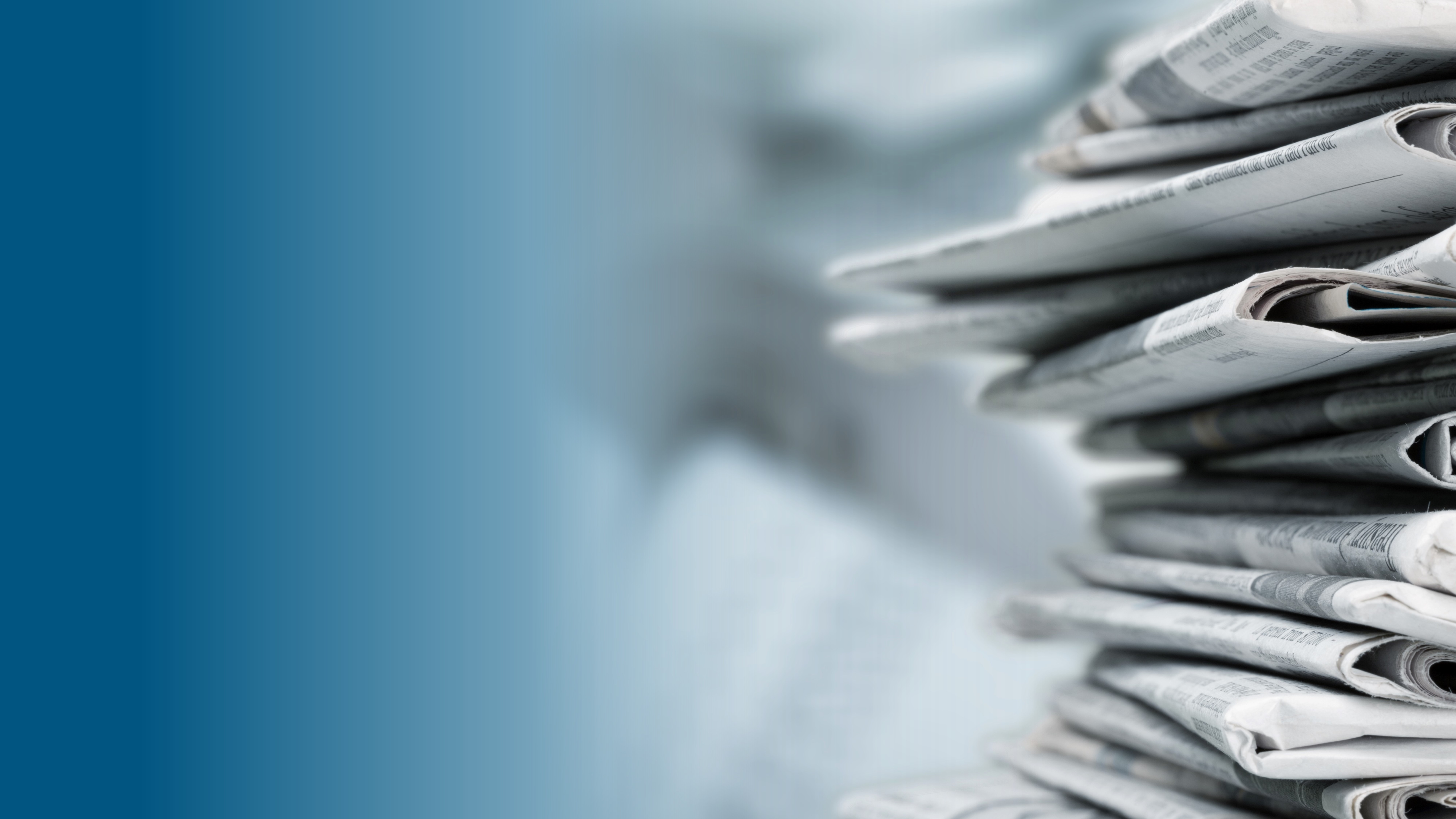 Picture of a stack of newspapers