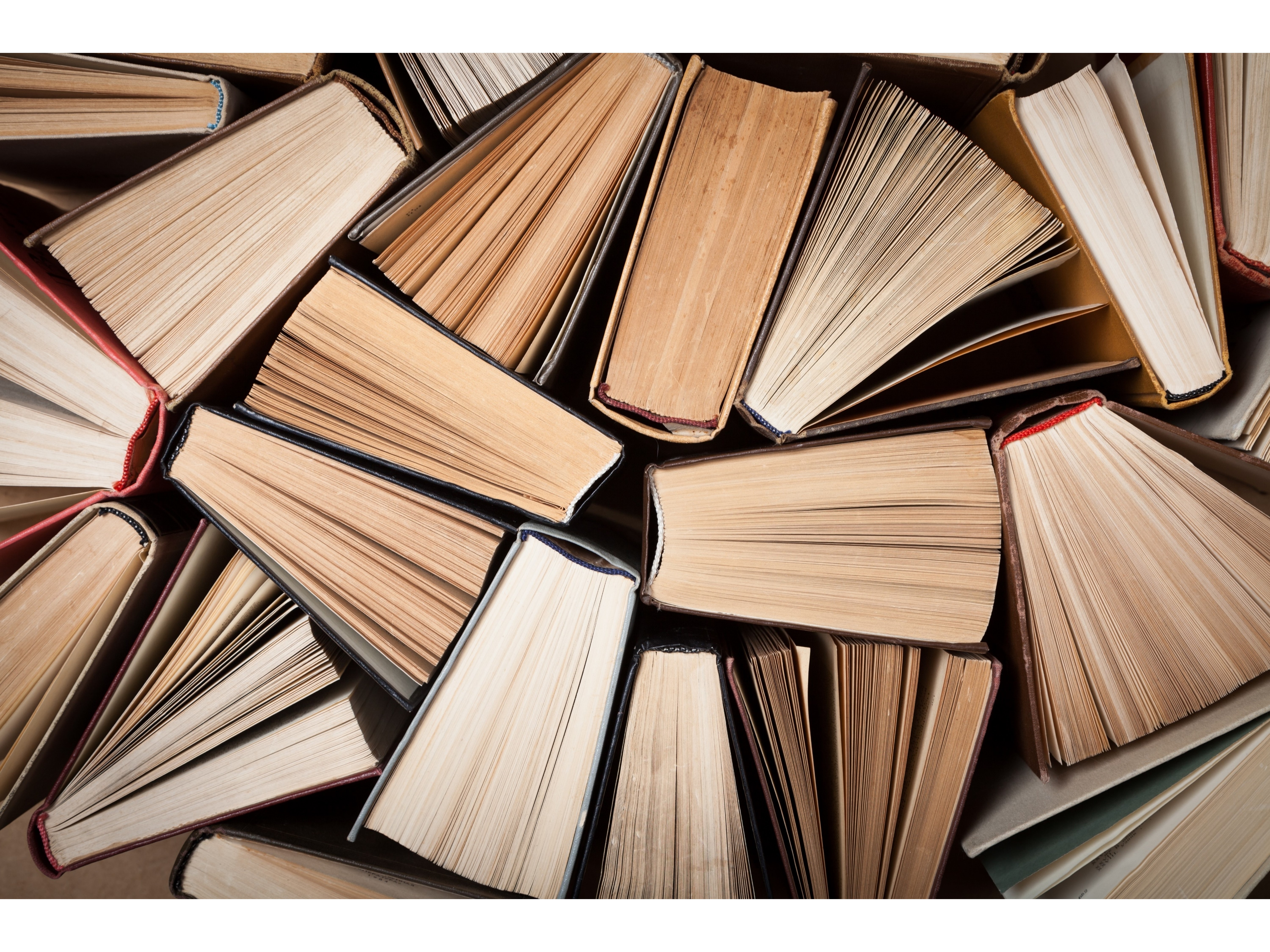 Image of books stacked on top of each other