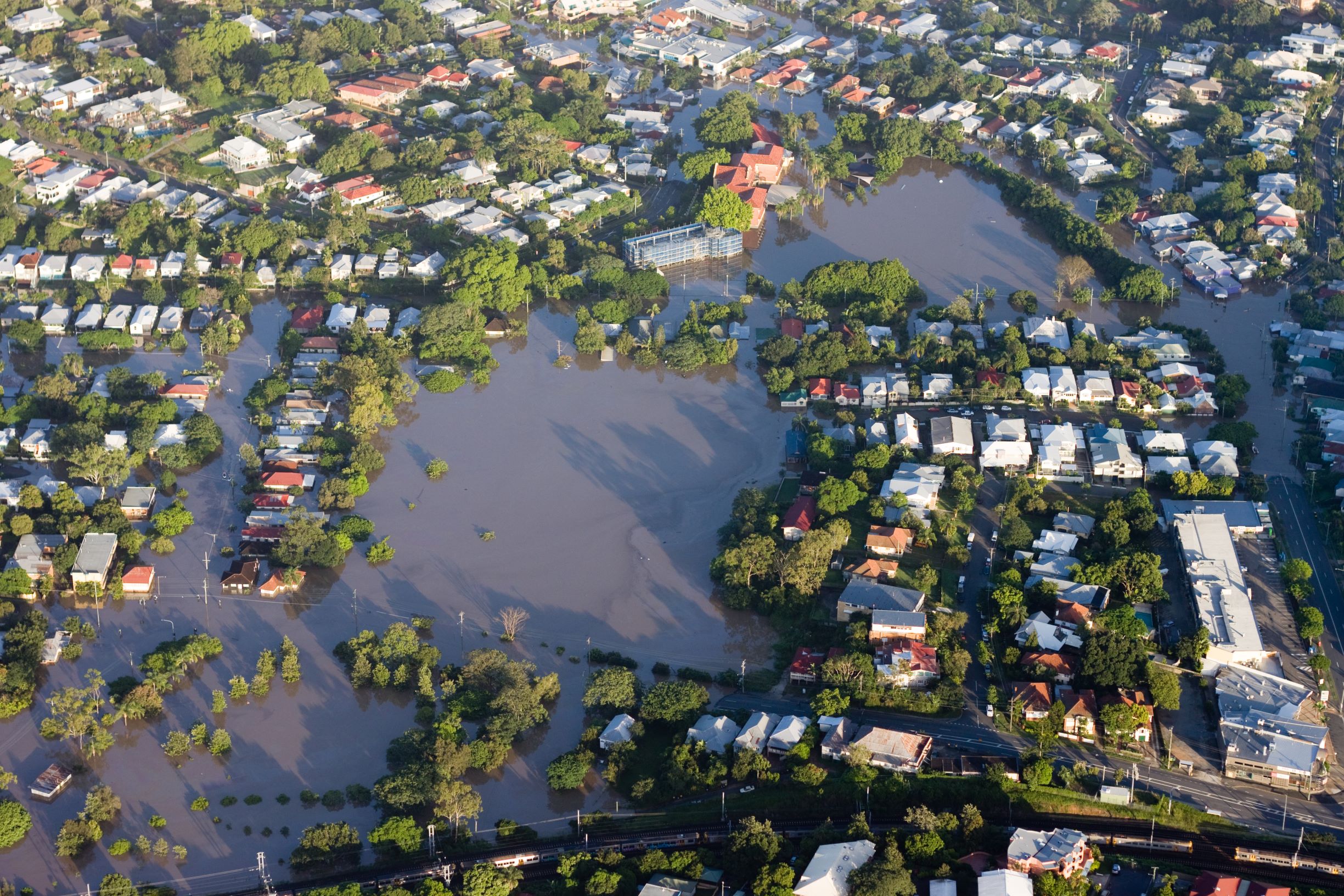 An aerial photography of a Brisbane urban area under water due to flooding