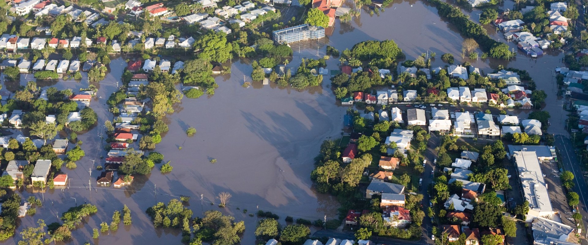 An aerial photography of a Brisbane urban area under water due to flooding