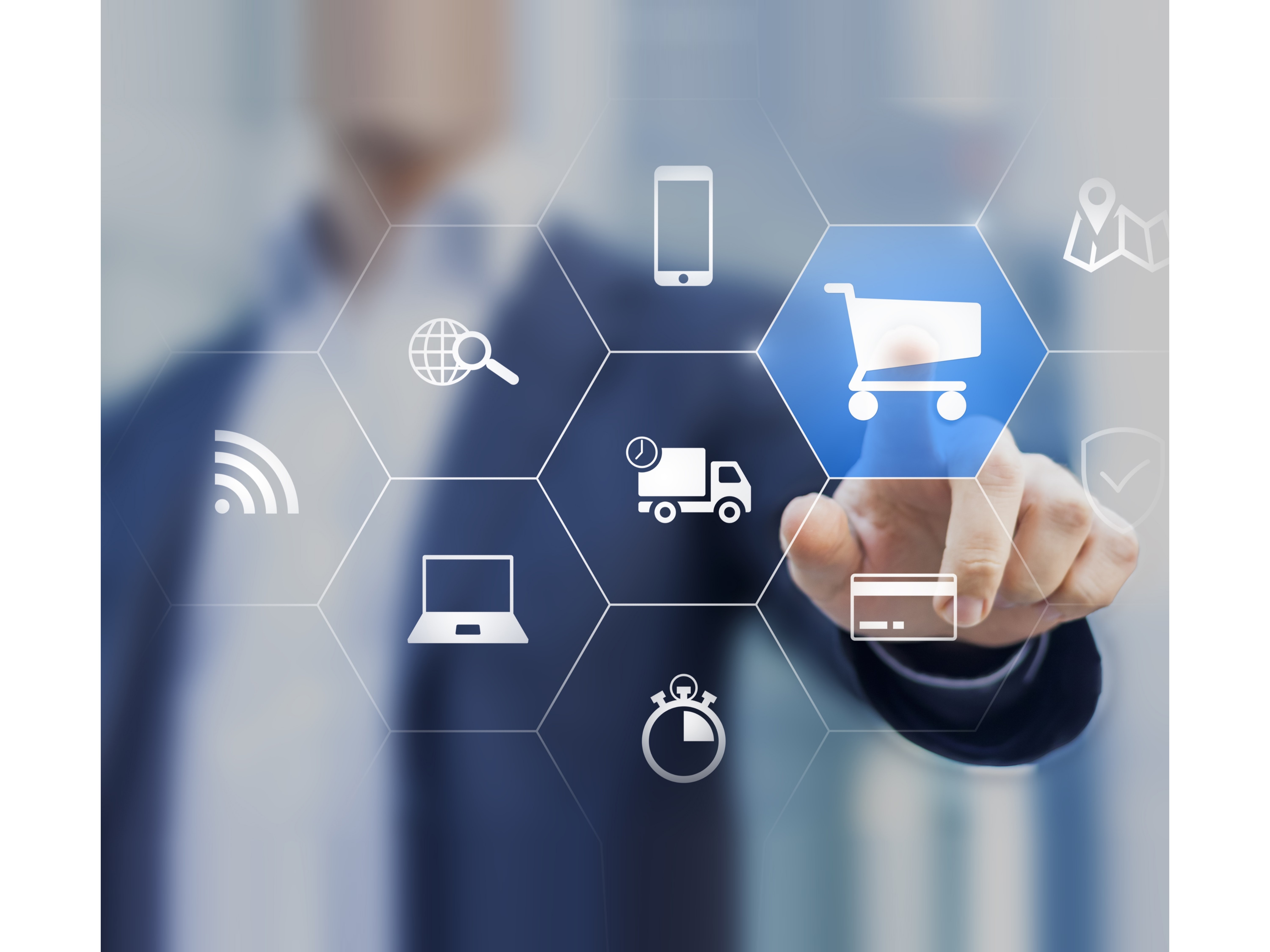 Image of man pointing to a shopping cart icon on a digital screen